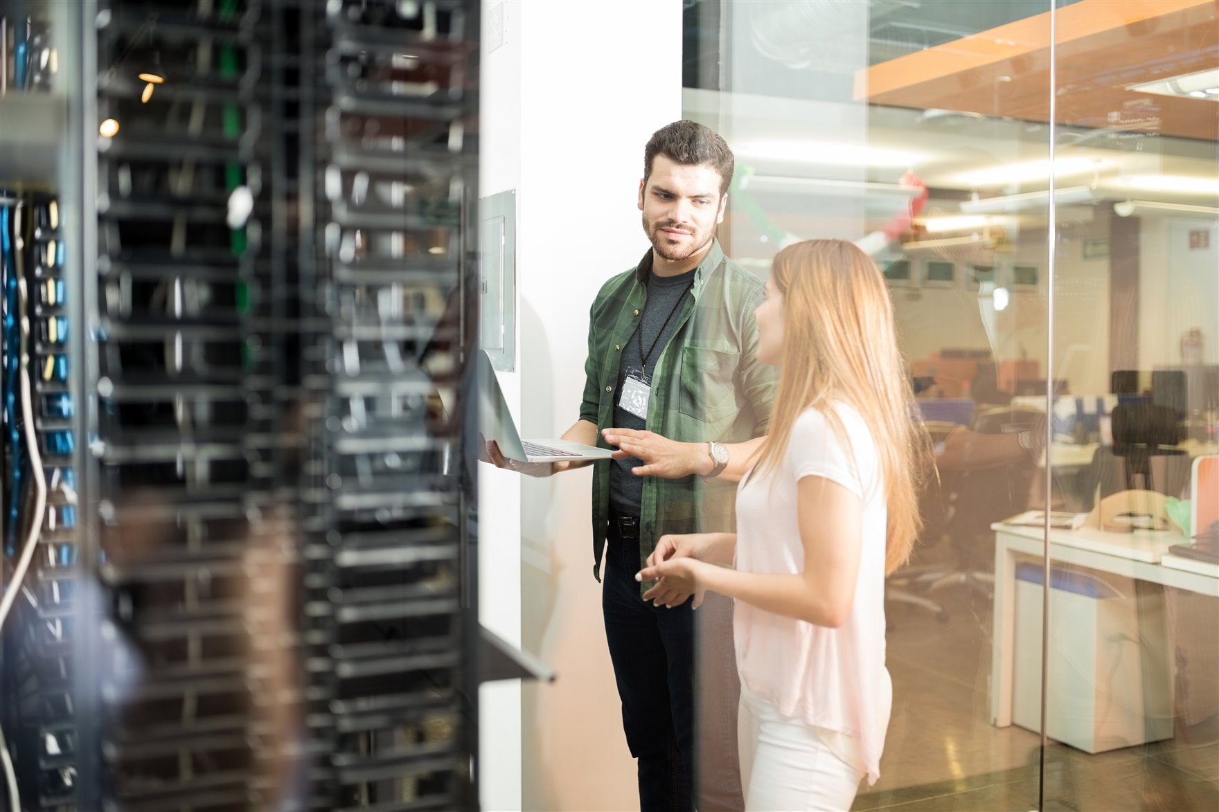 Specialists analyzing enterprise systems in a data center